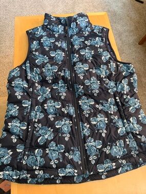 The North Face Navy Floral Quilted Puffer Vest with Blue Rose Print
